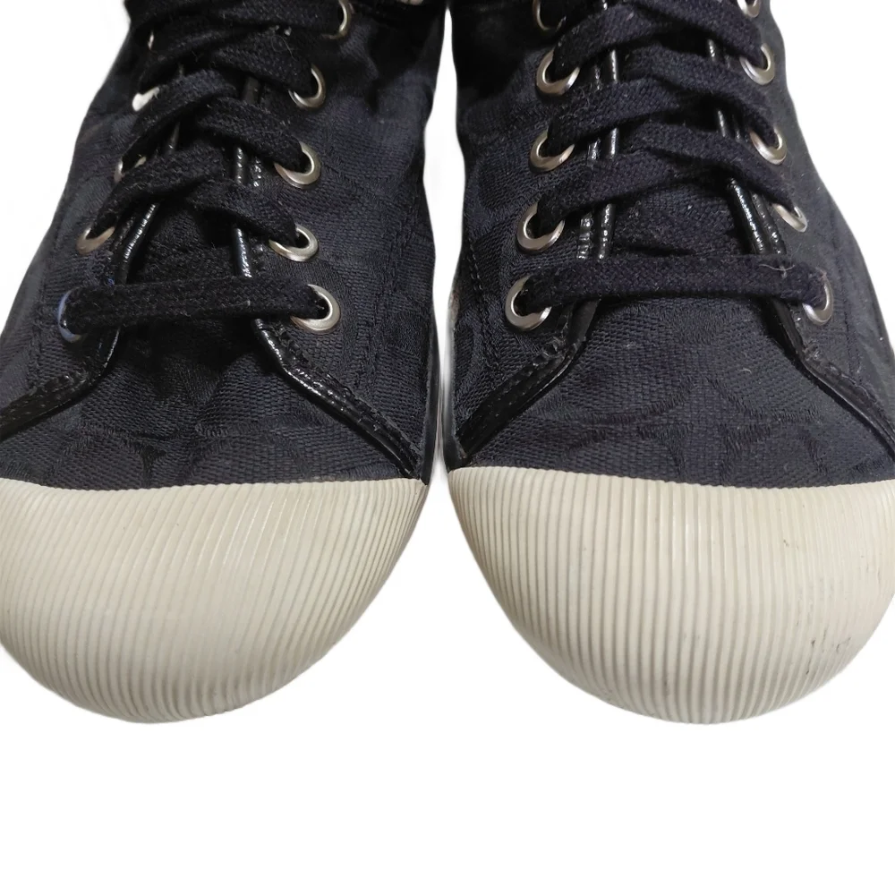 Coach sleek black